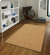 Minimalist modern rug in camel tone with embossed linear design
